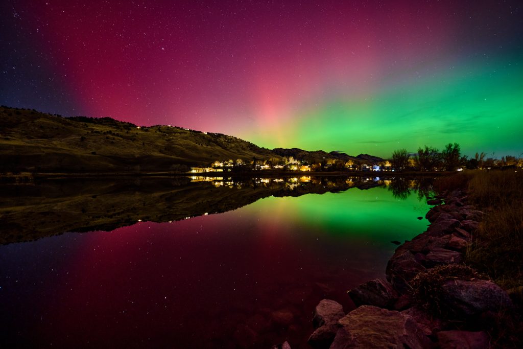 Aurora borealis (northern lights) glowing over Boulder, Colorado